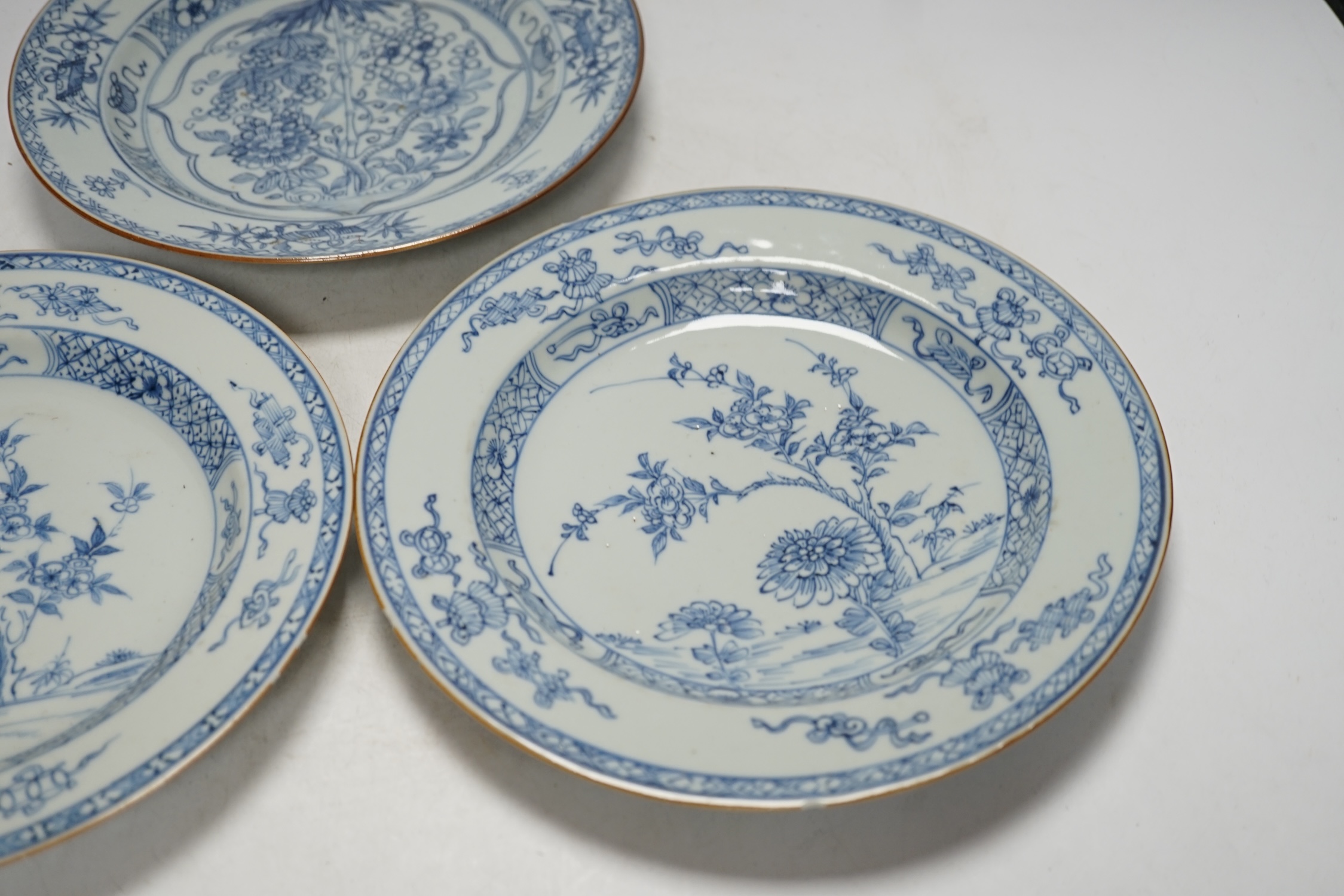 Three Chinese blue and white plates, Yongzheng-Qianlong, 23cm diameter